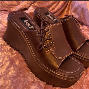 l.e.i dark brown wedge boots. Size 6.5